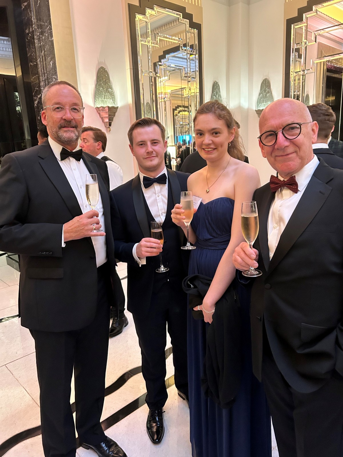 Megan and the 21 Hospitality group celebrating her win